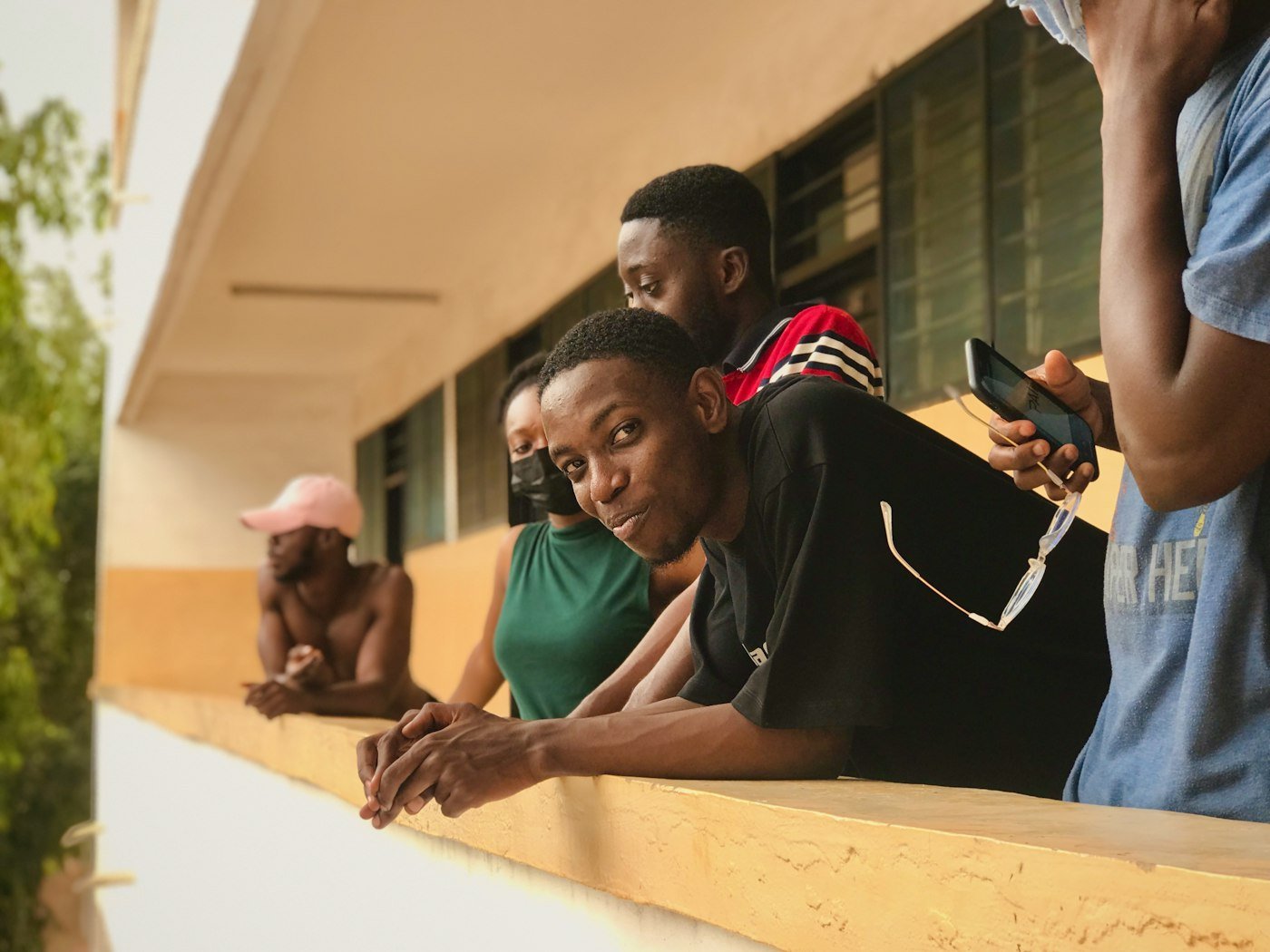 Students laughing together on a sunny weekend
