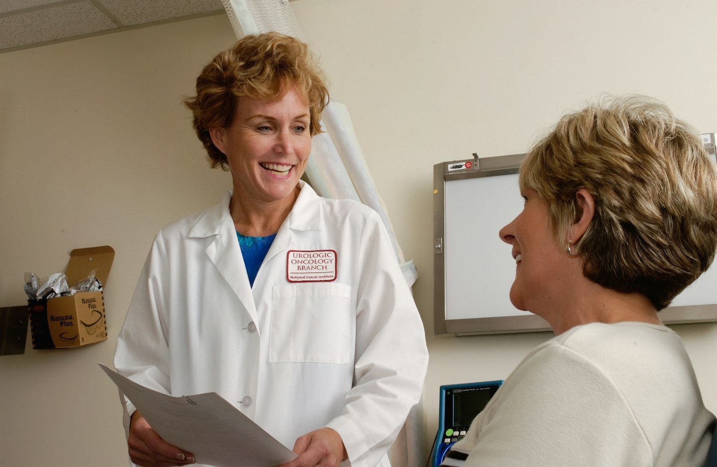 Doctor explaining a treatment to a patient during a consultation